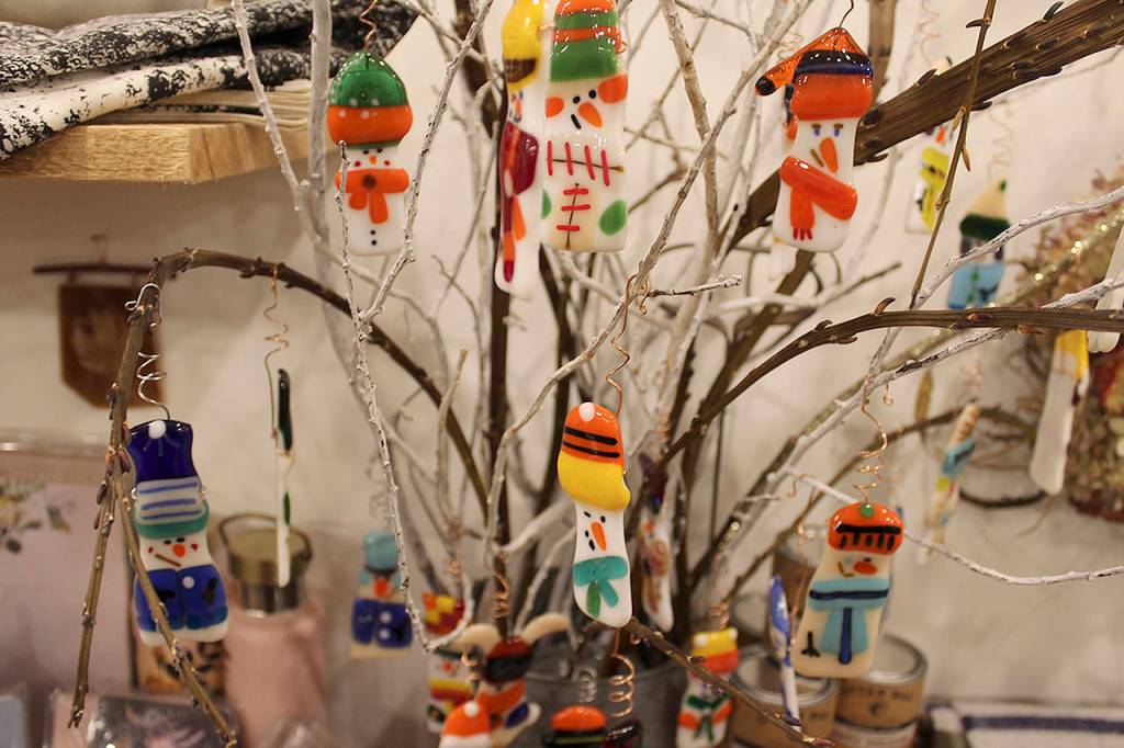 David Brown enjoys making these tiny fused glass ornaments to sell in his daughters shop, Flying Bear.