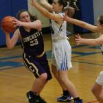 South Whidbeys Sammi Daly, center, and Ashley Lynch harass Concretes Cassidy Smith (23). (Photo by Jim Waller/South Whidbey Record)