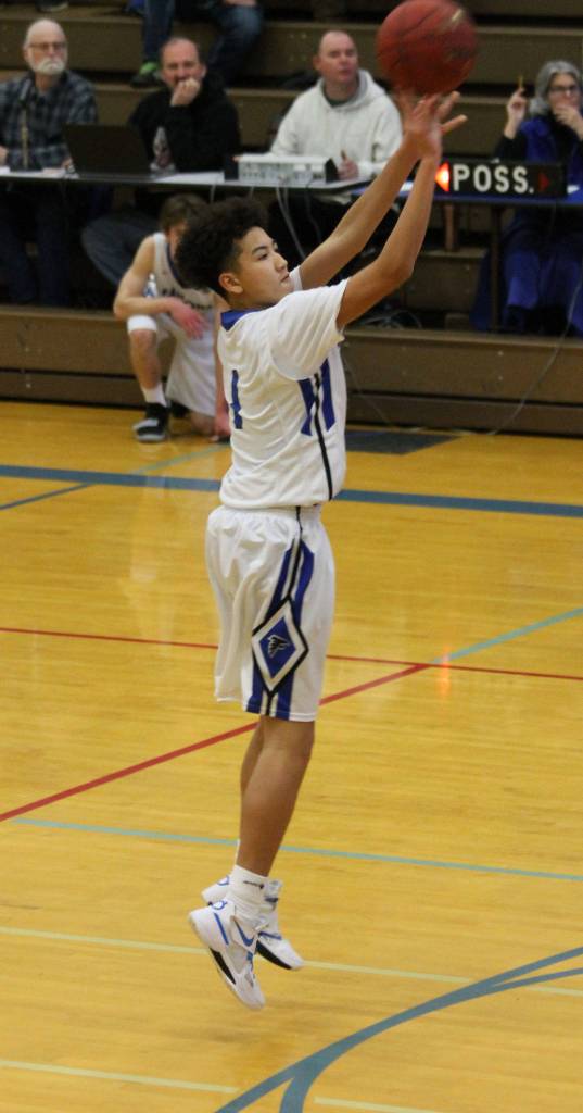 Jacob Ng unleashes a three-point shot.(Photo by Jim Waller/South Whidbey Record)