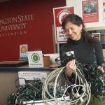 <strong>Photo by Maria Matson/Whidbey News Group.</strong>                                Sarah Bergquist of Waste Wise holds a pile of cords that have been recently donated at the Coupeville WSU Waste Wise location, totaling 140 pounds.