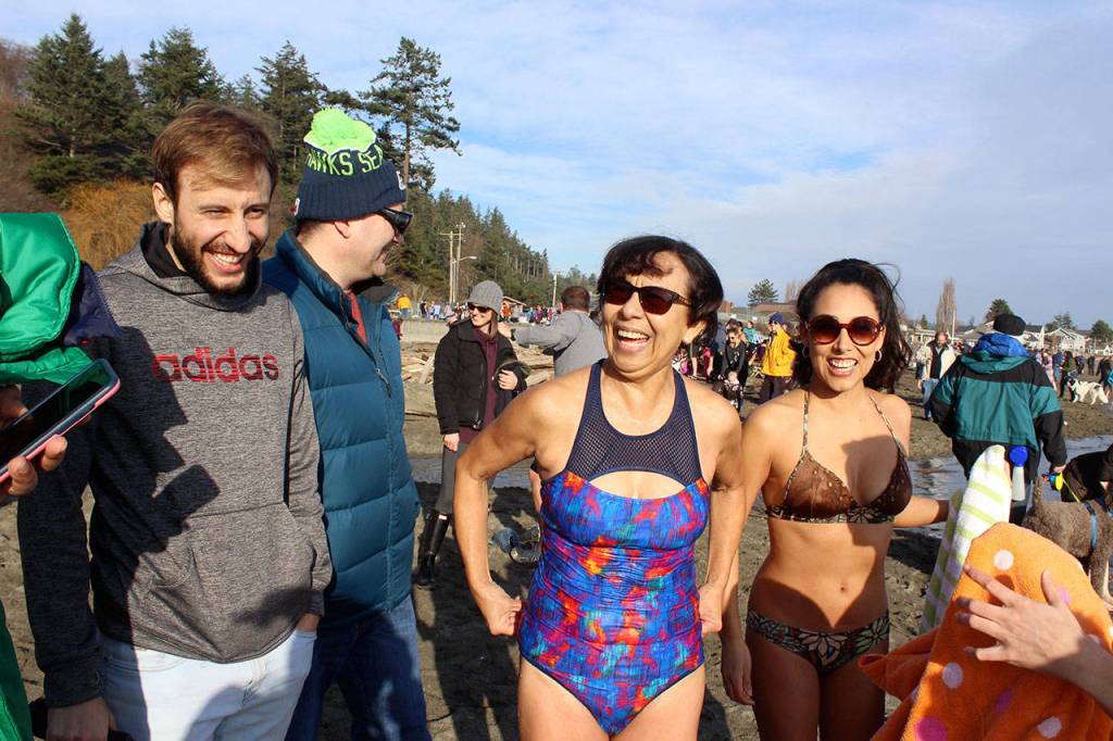 Irma Leahy, center, from Lynnwood celebrates the day with her family who came from near and far.