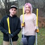 Pooper Trooper owners Conrad and Shannon Useman with their Pooper Trooper supplies. Photo by Laura Guido/Whidbey News Group