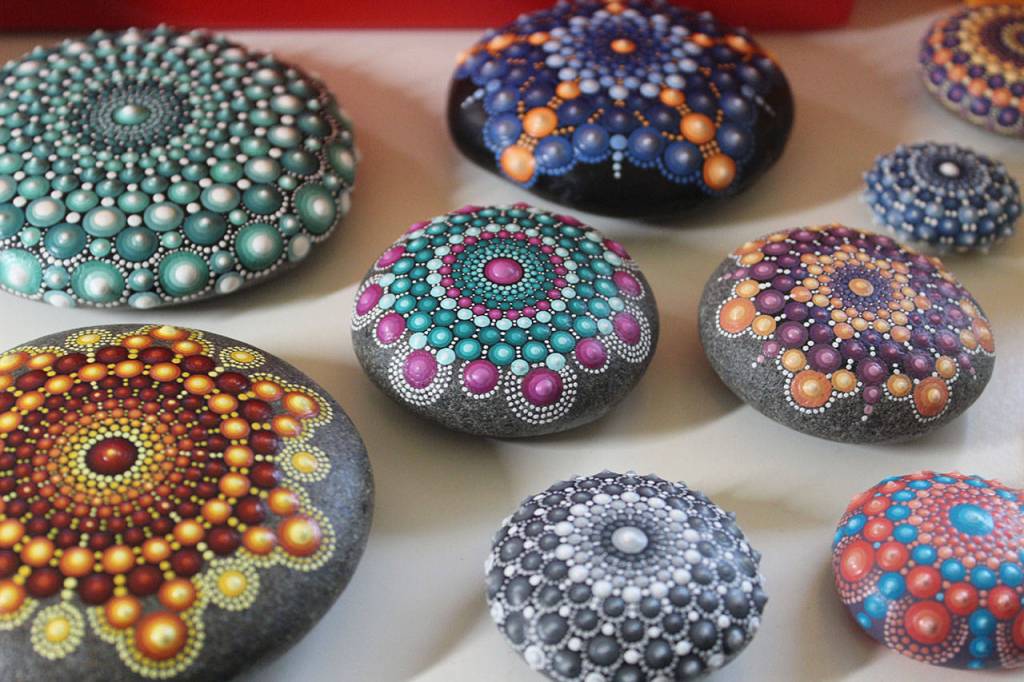 Many layers of paint and the patterns make the rocks appear beaded.