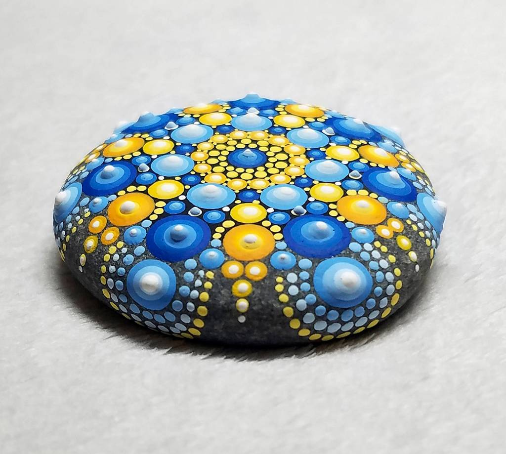 Prices range from $18 to $145 for mandala stones made by Renee Boyce.