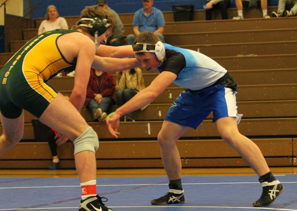 Sequaia Dunham, right, looks for an opening against Darrington.(Photo by Jim Waller/South Whidbey Record)