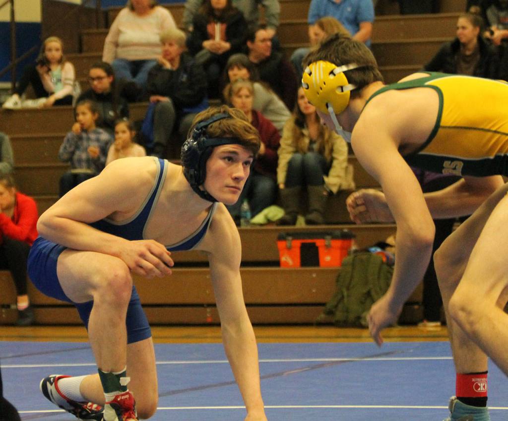 Caleb McArthur, left, prepares to attack his Darrington opponent.(Photo by Jim Waller/South Whidbey Record)