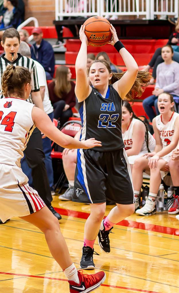 Kayla Knauer (22) looks for an open teammate as Coupevilles Lindsey Roberts defends.(Photo by John Fisken)