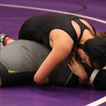 South Whidbeys Nicole Helseth, top, tries to pin Lyndens Jennifer Lopez.(Photo by John Fisken)