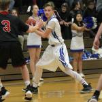 Senior Brock Gray looks for an open teammate.(Photo by Jim Waller/ South Whidbey Record)