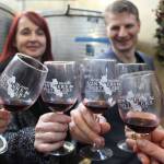 A group of friends toast during last years Red Wine and Chocolate Tour thats sponsored by Whidbey Island Vintners and Distillers Association. (Photo by Patricia Guthrie/Whidbey News Group)