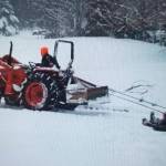 Helen Price Johnsons photo shows three generations having fun on a snowy Sunday.