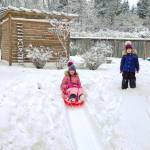 Fourth-grader Lily Kirmo, left, and kindergartner Ella Kirmo enjoy their days off sledding and drinking a lot of hot cocoa.