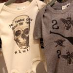Shakespearean quotes adorn an assortment of clothing for sale at The Bards Boutique.