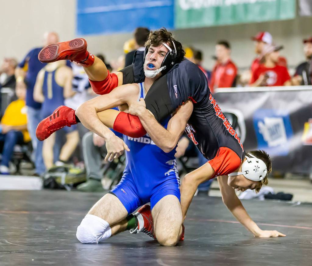 Aposhyan tries to take down Port Townsends Carter Swartout.(Photo by John Fisken)