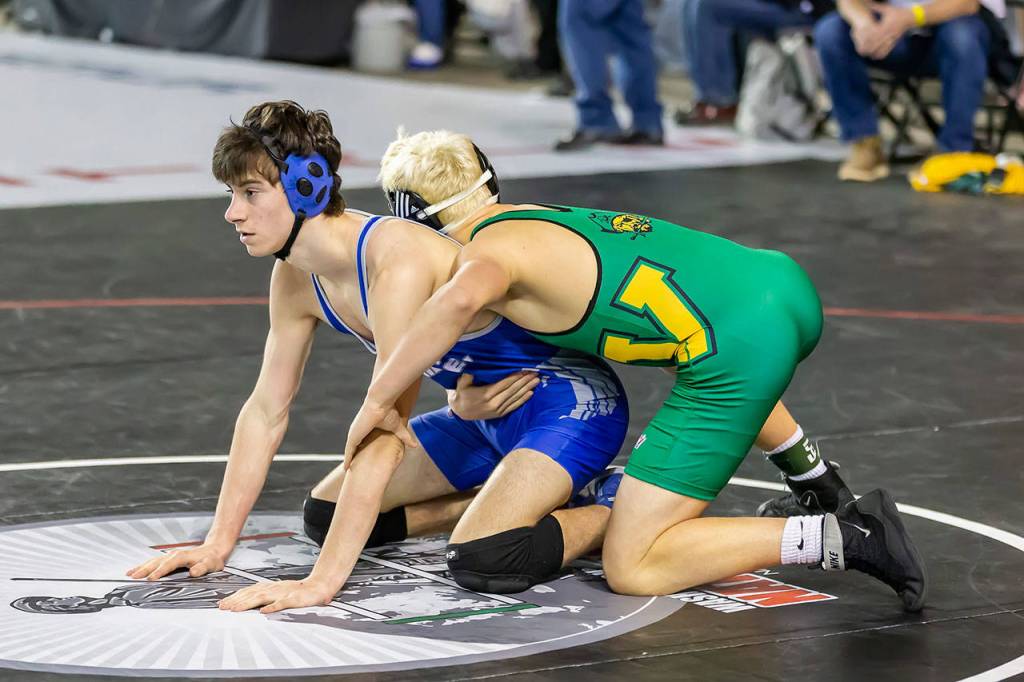 Batiste gets ready to start a round with Ryan Nelson of Vashon Island.(Photo by John Fisken)