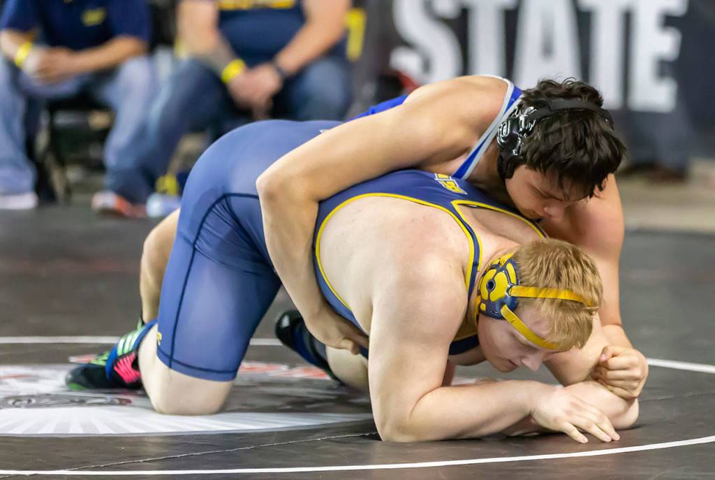 South Whidbeys Dylan Davis, top, takes on Luke Crippen of Naches Valley.(Photo by John Fisken)