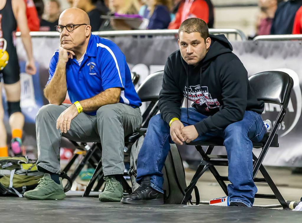 South Whidbey coaches take in the action at state.(Photo by John Fisken)