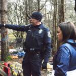 Officer Mel Lolmaugh, Oak Harbor Police Department, points out to Cynthia Besaw, county veterans resource coordinator areas homeless individuals have been known to occupy in an area called The Pit off Goldie Road. He accompanied Besaw and other volunteers to the area during the annual Point in Time homeless population count in January. Photo by Laura Guido/Whidbey News-Times