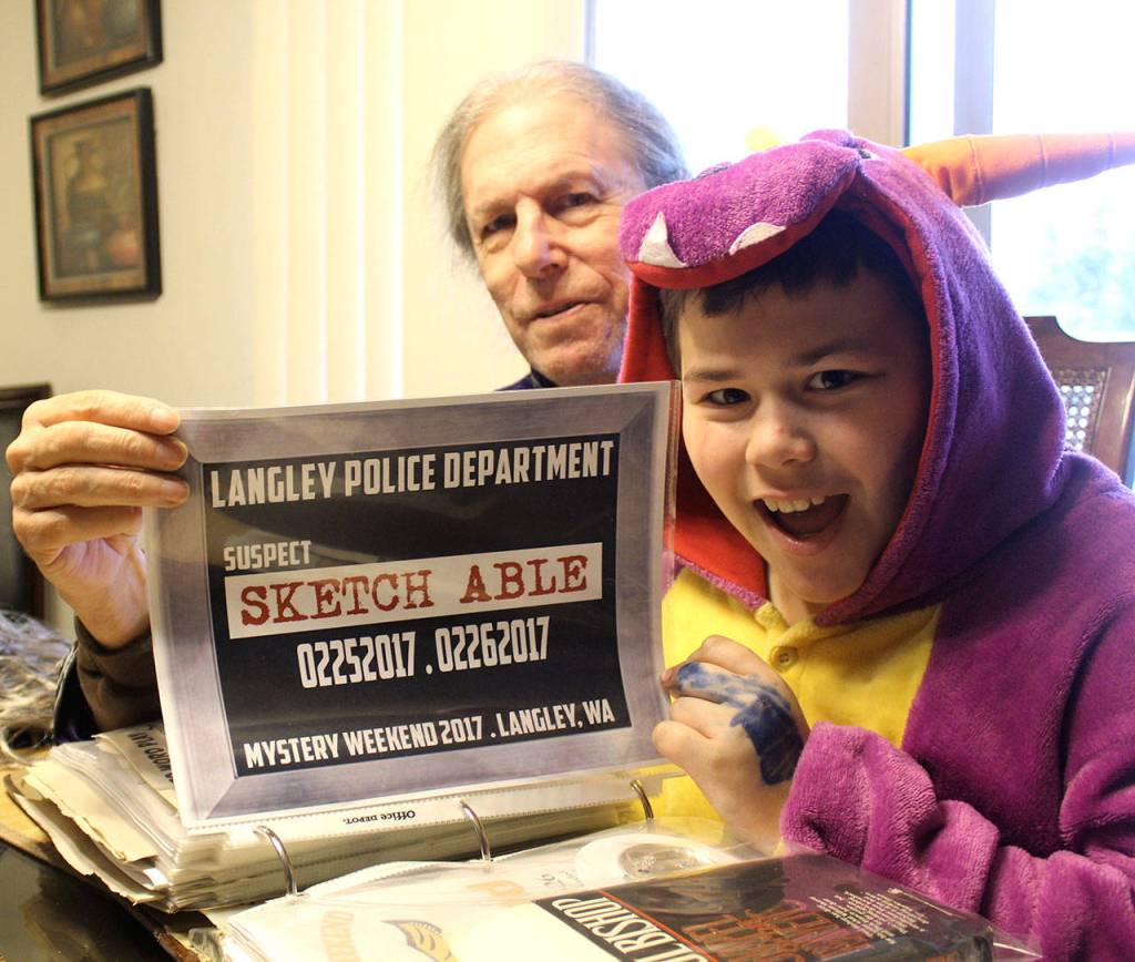 For the past three years, John Ball and his young relative, Shayne Thomas, have teamed up to play different roles in Mystery Weekend. They recently looked through a memory book showing their characters, including one named Sketch Able.