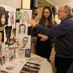 Many people stopped by to praise artist Gabriella Toombs during the Whidbey Island Waldorf School annual eighth-grade project presentations. (Photos by Patricia Guthrie/Whidbey News Group)