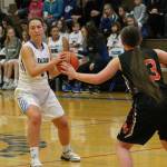 Farriss Jokinen, left, passes against Granite Falls. The senior guard received the Sportsmanship Award for South Whidbey this season. (Photo by Jim Waller/South Whidbey Record)