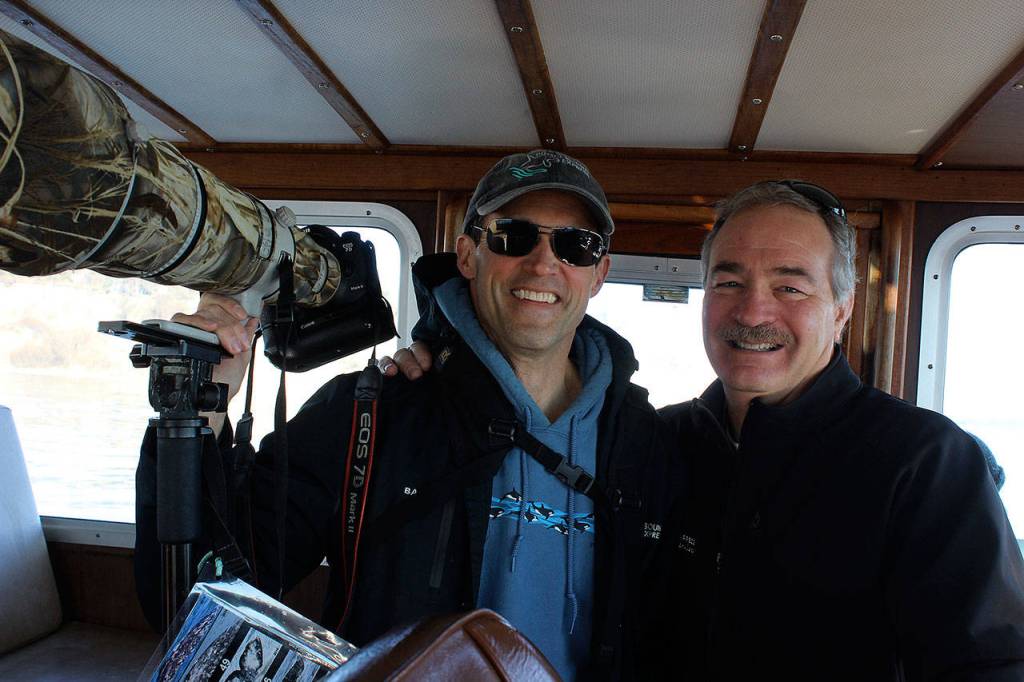 Photographer and naturalist Bart Rulon has become good friends with Puget Sound Express owner Pete Hanke after several years working for the whale tour company. (Photo by Patricia Guthrie/Whidbey News Group)