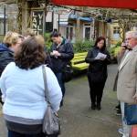 Ben Parks, playing Mark Twains cousin, Samuel Clemens, stands outside a crowded Sweet Monas Chocolate Boutique as he travels through time during Mystery Weekend this past February. After grilling suspects, such as Clemens/Parks, chilly, windy weather sent many participants in search of hot chocolate, coffee, food and spirits around Langleys restaurants, bars and other outlets. Sweet Monas and Village Wine next door reported record sales, according to the Chamber of Commerce. (Photo by Patricia Guthrie/Whidbey News Group)