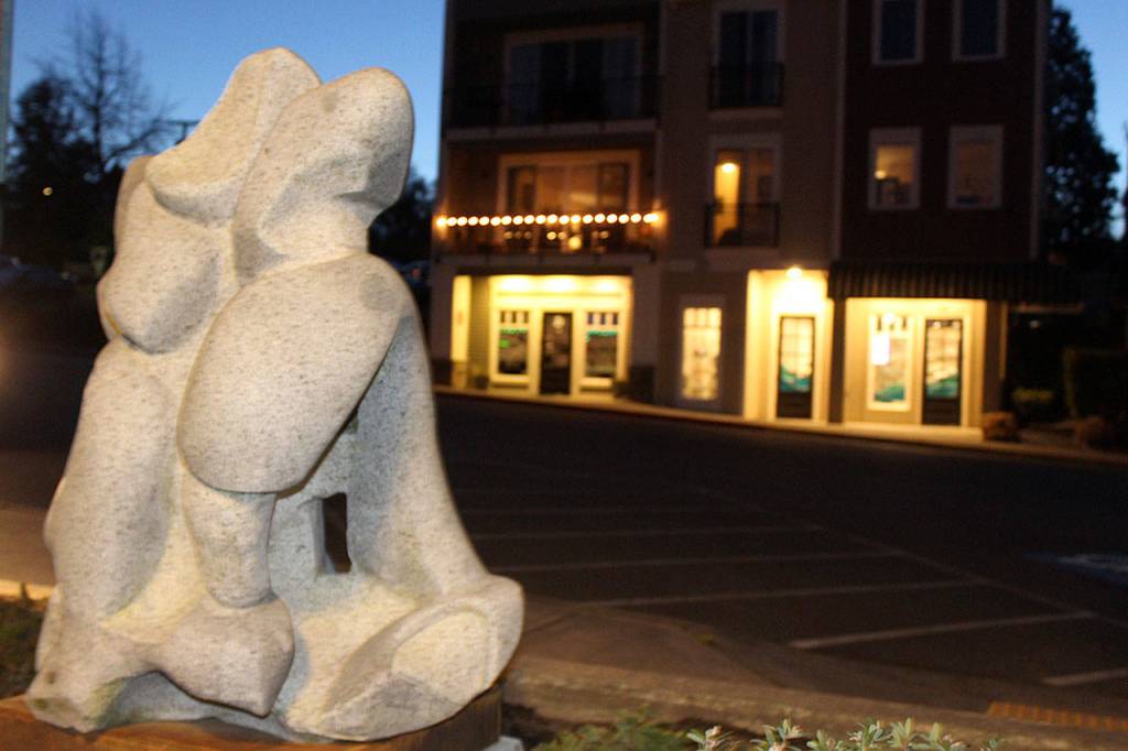 In the evening light and looking away from the Langley Visitor Center, the granite sculpture takes on a different dimension. (Photo by Patricia Guthrie/Whidbey News Group)