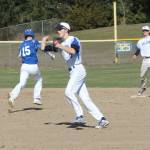 Second baseman Jon Bartel tosses to first for an out. (Photo by Jim Waller/Sound Whidbey Record)