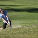 South Whidbeys Alyssa Ludtke blasts out of trouble at the Whidbey Shootout Tuesday. (Photo by John Fisken)