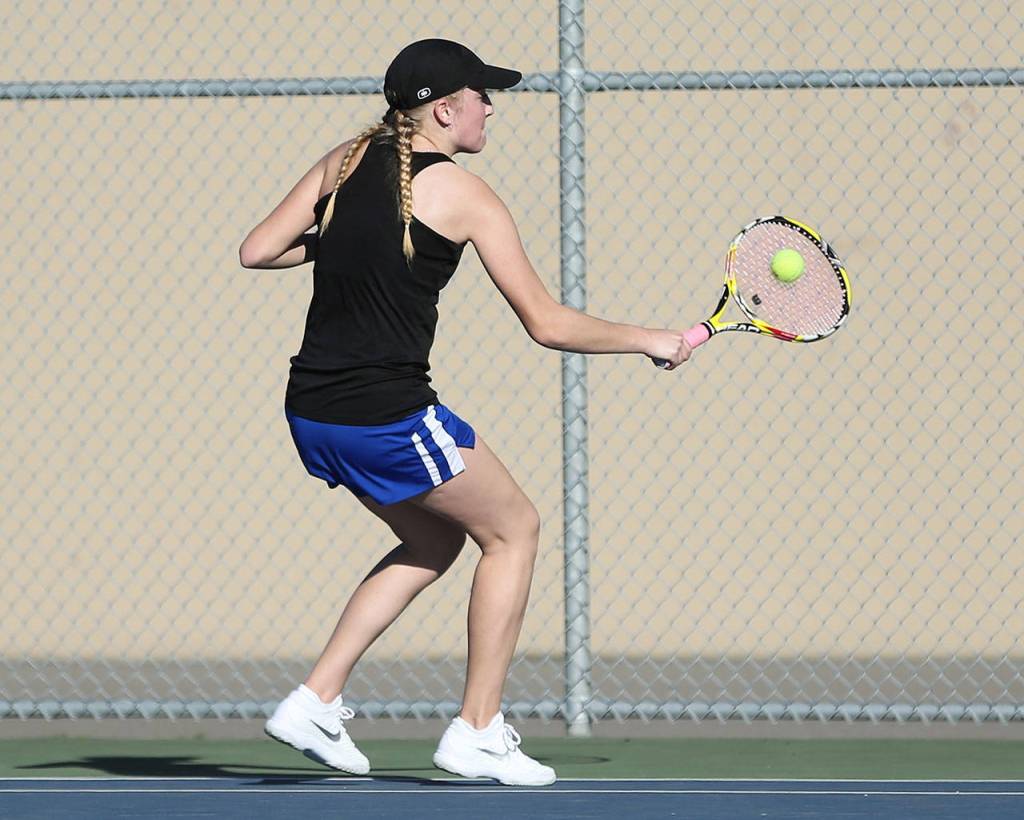 Ainsley Nelson hustles to run down a sideline shot.(Photo by John Fisken)