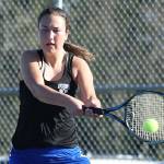 Farriss Jokinen slaps a backhand in first singles. (Photo by John Fisken)