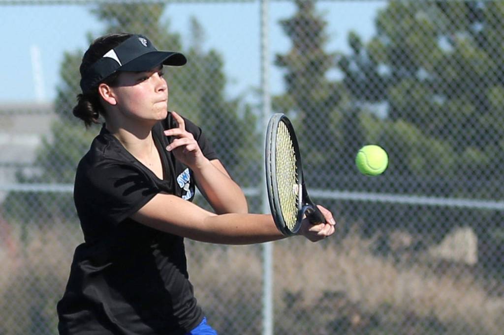 Alison Papritz powers a shot in her first doubles shutout with Mary Zisette.(Photo by John Fisken)