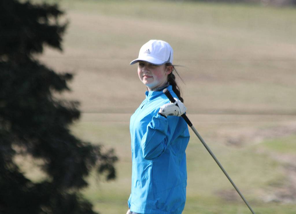Laci Pihlman reacts to her opening tee shot.(Photo by Jim Waller/South Whidbey Record)