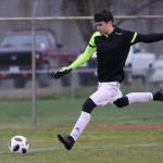 Tyler Daniels puts the ball in play.(Photo by Matt Simms)