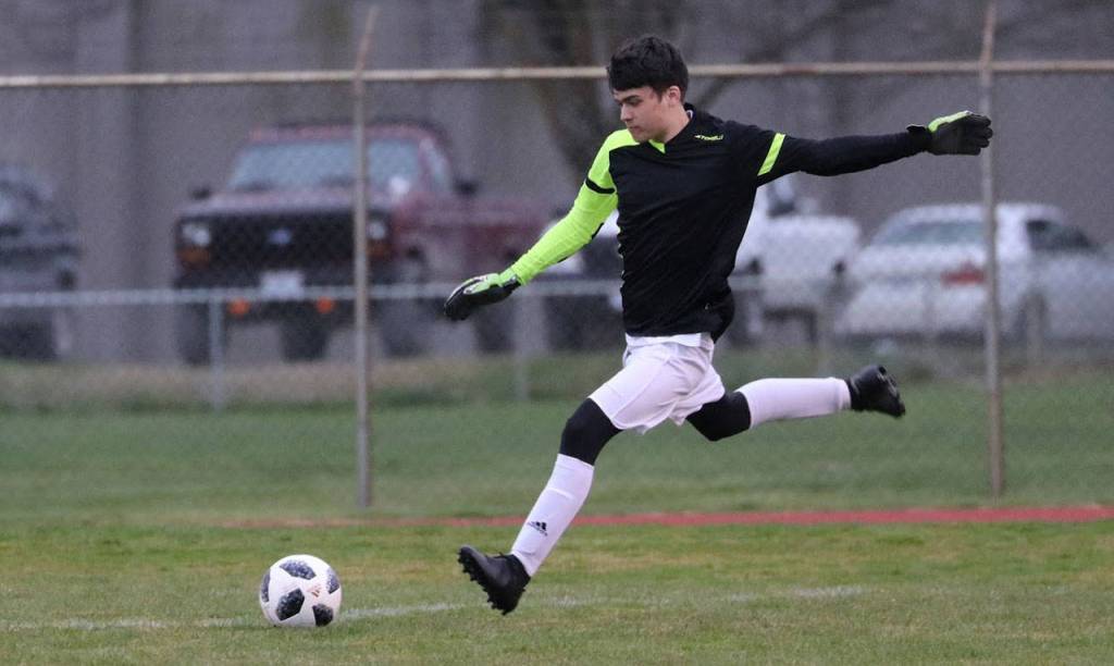 Tyler Daniels puts the ball in play.(Photo by Matt Simms)