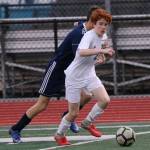 Aidan Donnelly looks for an open teammate in Wednesdays match.(Photo by Matt Simms)