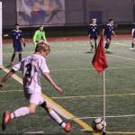 Thnomas Simms sends a corner kick toward the Falcon goal.(Photo by Matt Simms)