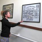 (Photo by Dave Felice)                                Langley Community Center Artistic Coordinator Jesse Levesque demonstrates the recently digitized Langley High School Class of 1961.
