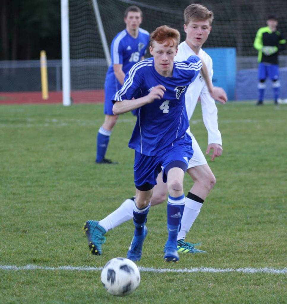 Reilly McVay hustles to the ball for a South Whidbey possession.(Photo by Matt Simms)