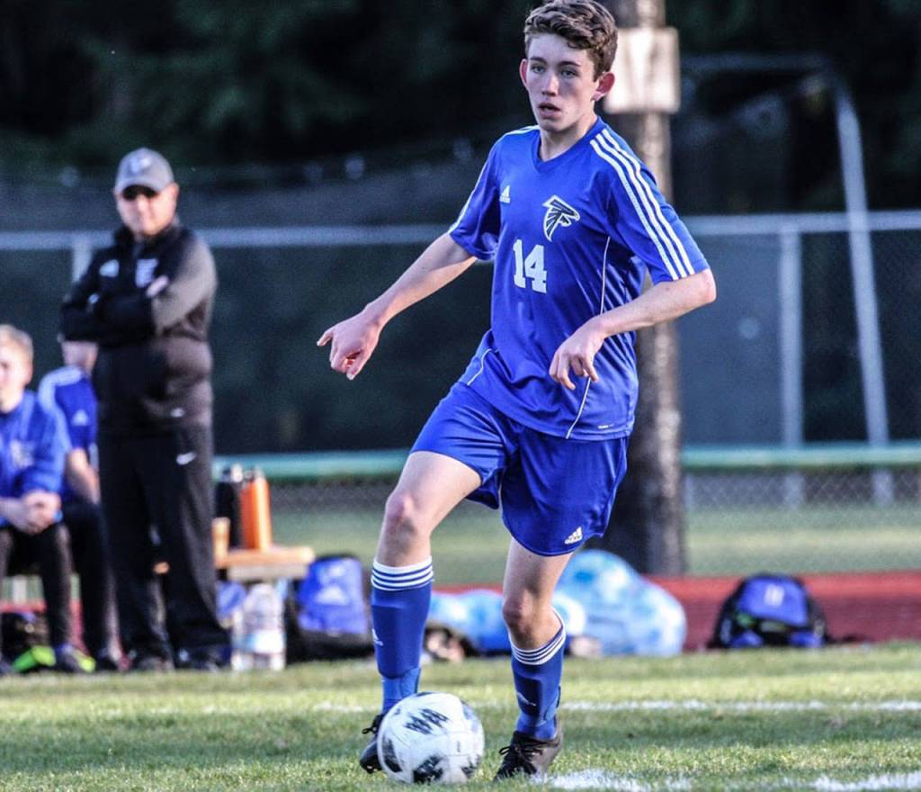 Aidan OBrien looks for an opening in the Coupeville defense.(Photo by Matt Simms)