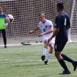 Joey Lane boots the ball up field.(Photo by Matt Simms)