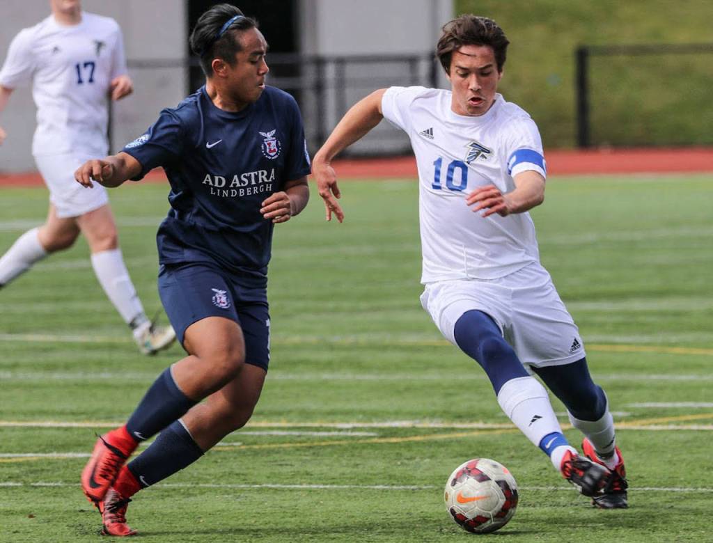 Michael Lux, right, hustles to the ball.(Photo by Matt Simms)