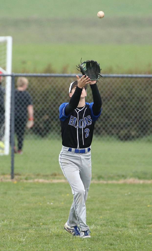 Right fielder Luke Rookstool settles under a fly ball.(Photo by John Fisken)