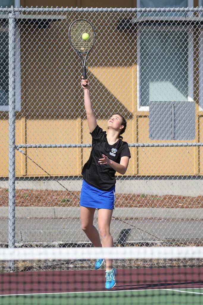 Alison Papritz serves at Coupeville Tuesday. (Photo by John Fisken)