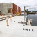Olivia Vanni / The Herald                                A ferry pulls into the current Mukilteo Ferry Terminal as construction continues on at the site of the new Mukilteo ferry terminal on Wednesday.