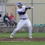 Brent Batchelor puts down a squeeze bunt to drive in South Whidbeys first run.(Photo by Jim Waller/South Whidbey Record)