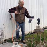 Lloyd Whannell works on a small sculpture at Freeland Art Studios. Whannell, Lane Tompkins and Therese Kingsbury are slated to be recognized for their work during a 1 p.m. Saturday ceremony celebrating International Sculpture Day. (Photo provided)