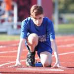 Photos: Cougars win 3-team meet / Middle school track