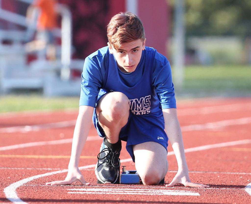 Photos: Cougars win 3-team meet / Middle school track